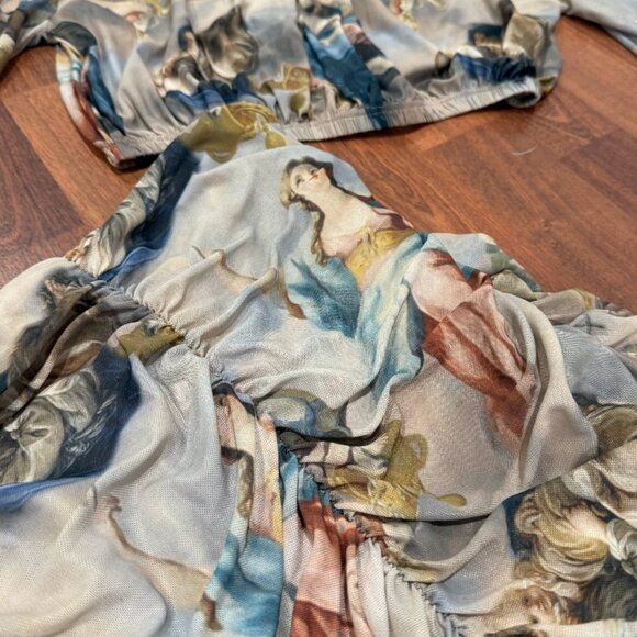 Ruched crop top and leggings set with a Renaissance-style cherub print. - Picture 2 of 2